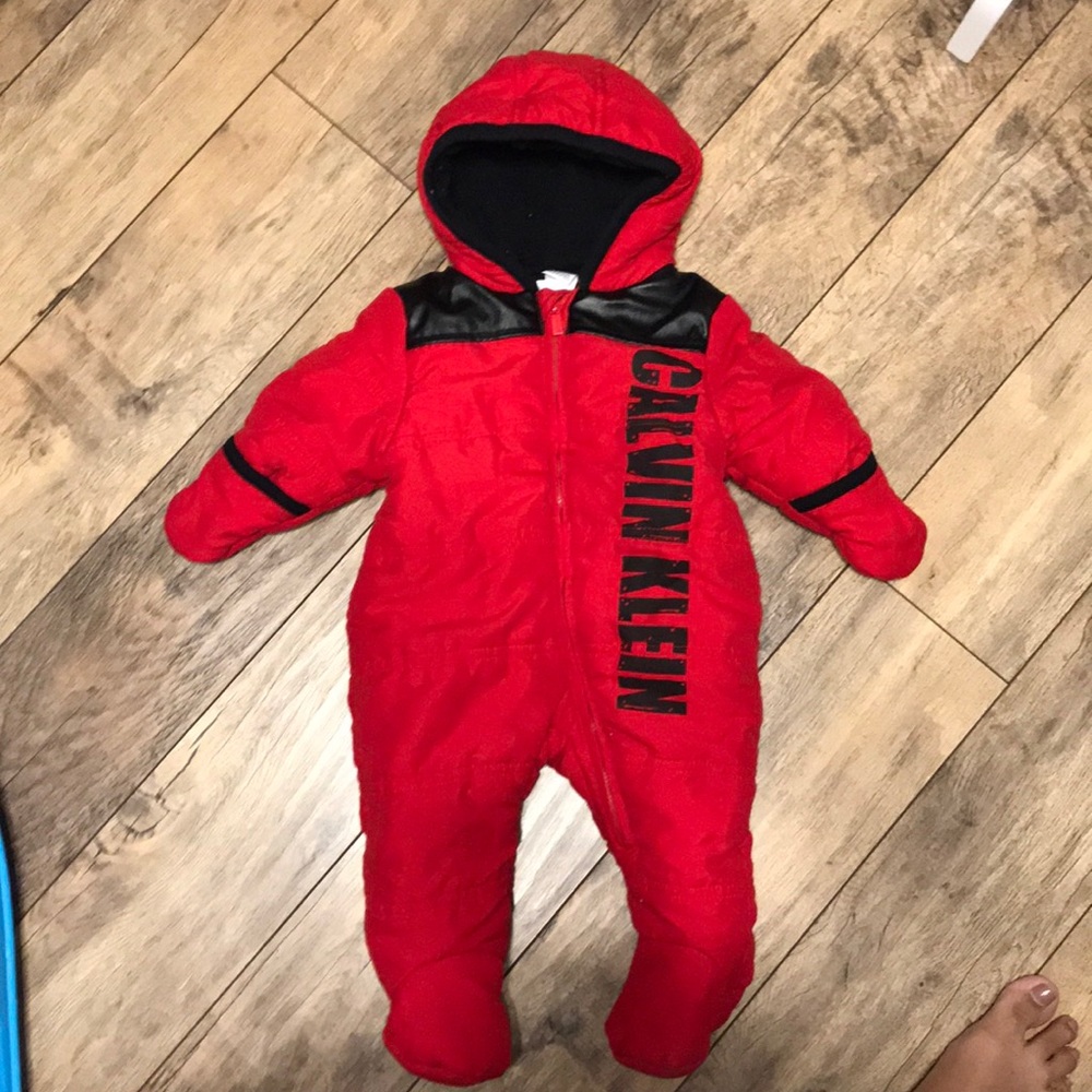 Calvin Klein’s red winter coat